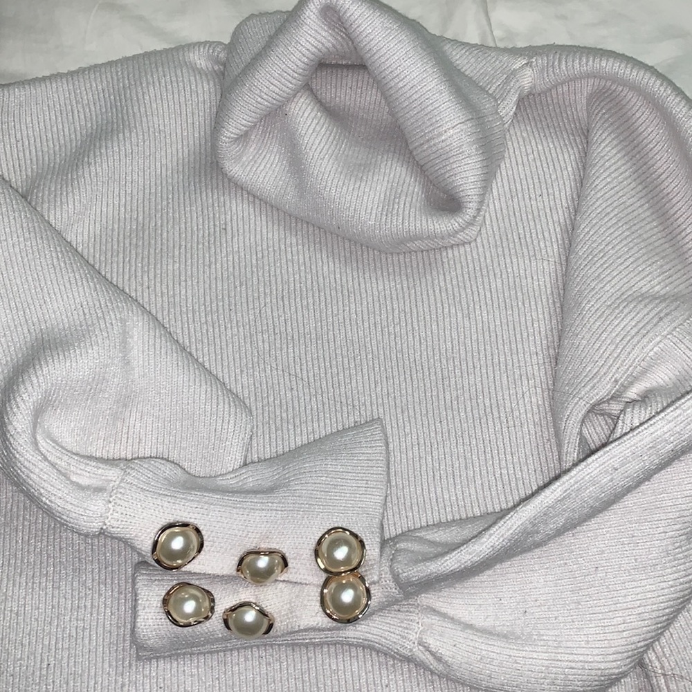 Cropped sweater.